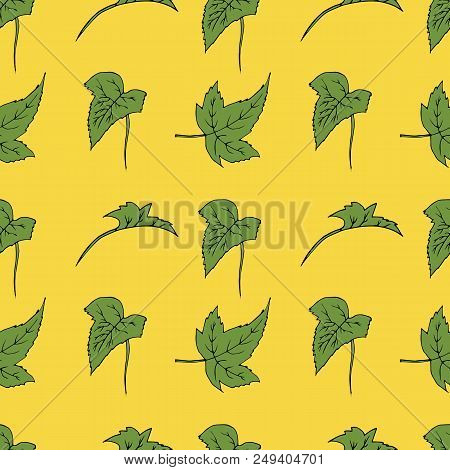Seamless Texture Of Green Leaves. Hand Drawn Illustration On Yellow Background