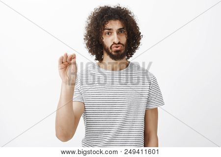 Shut Up Please. Portrait Of Bothered And Pissed Off Handsome Male Model With Curly Hair And Beard, S