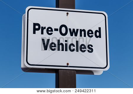 Pre Owned Vehicles Sign At A Used Car Dealership I