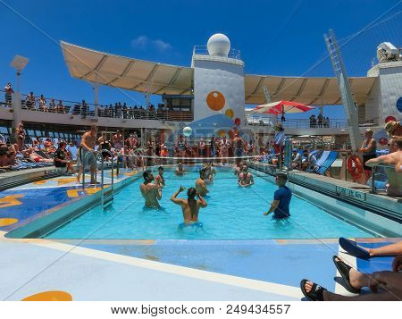 Cape Canaveral, Usa - May 03, 2018: The People Playing At Pool At Upper Deck In Mini Volleyball At C