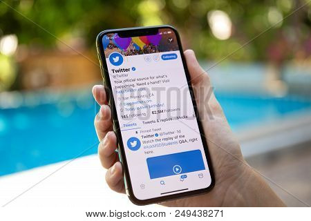 Koh Samui, Thailand - March 21, 2018: Woman Hand Holding Iphone X With Social Networking Service Twi