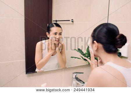 Asian Woman Cleaning Face Skin Enjoy Herself With Bubble Cleansing Foam.