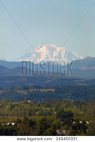 Snow Covered Mount Adams In Washington State On A Clear Blue Sky Day