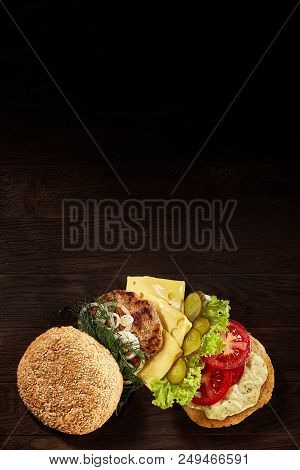 Close-up Of Delicious Fresh Home Made Burger With Piccoli, Lettuce, Cheese, Onion, Tomato, Dill And 