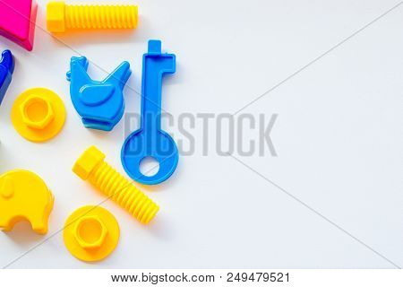 Set Of Toys For Babies On A White Table