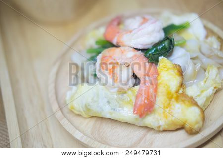 Stir-fried Noodle With Seafood And Kale In Gravy Sauce. Thai Food.