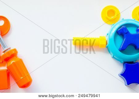 Set Of Toys For Babies On A White Table