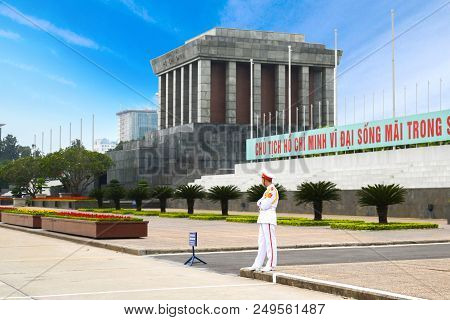 Hanoi, Vietnam - Feb 20, 2017 :    Ho Chi Minh Mausoleum With Guard In The Foreground. Chu Tich Mean