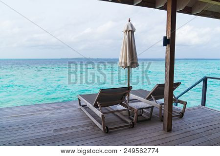 Beautiful Tropical Maldives Island Summer Vacation Relaxing At Overwater Villa In Luxury Resport.