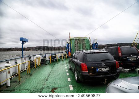 Klaipeda, Latvia - April 02, 2018: Cars On The Ferry In Klaipeda Near Curonian Spit In A Cloudy Day