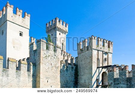 Sirmione, Italy - August 10, 2008: Garda Lake, The Rocca Scaligera Castle (xiii Century)