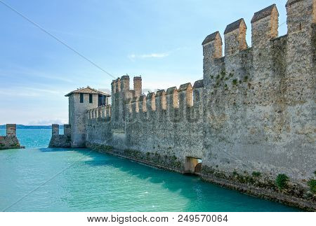 Sirmione, Italy - August 10, 2008: Garda Lake, The Rocca Scaligera Castle (xiii Century)