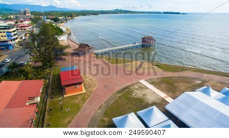 Sipitang,sabah-july 6,2018:aerial View Of The Wooden Pier Or Jetty With Hut At Esplanade In Sipitang