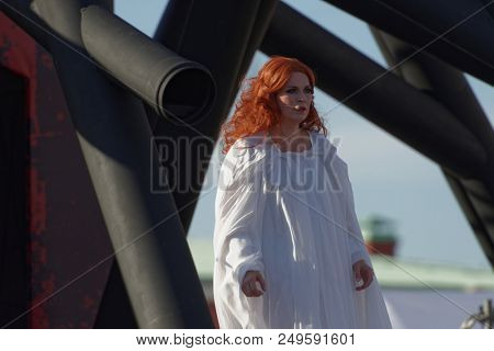 ST. PETERSBURG, RUSSIA - JULY 15, 2018: Julia Gertseva as Lady Macbeth in the opera Macbeth outdoors during the festival All Together Opera. It was 2nd of 4 performances