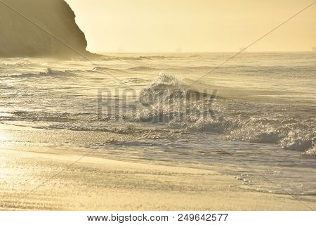 Large Ocean Waves Crashing Onto The Coast