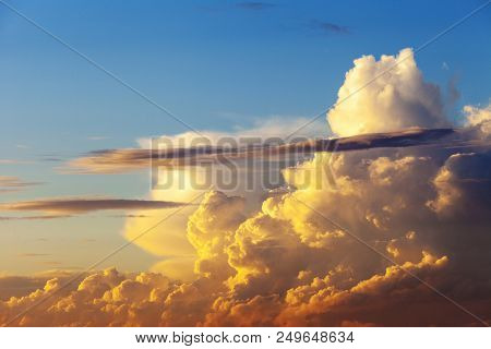 Heapy Clouds With Warm Sunset's Ray.