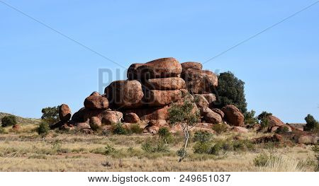 Massive Boulders Formed By Erosion In The Karlu Karlu, Devils Marbles Area Of The Outback (northern 