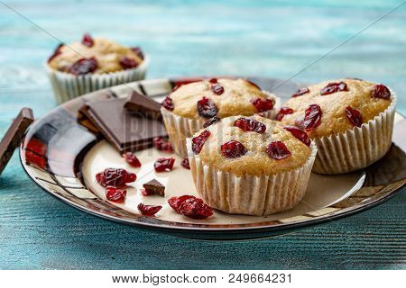Homemade Cupcakes With Cherries Are Located On A Light Background. A Few Cupcakes Are Located On A W