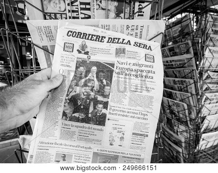 Paris, France - Jul 16, 2018: Man Buying Corriere Della Sera Newspaper Announcing France Champion Ti