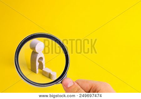 A Wooden Figure Of A Woman With A Void From Which A Child Fell. The Concept Of The Loss Of A Child, 