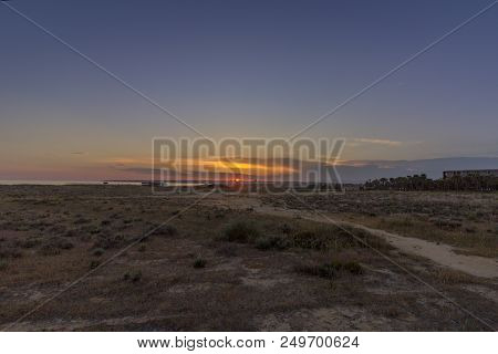 Sunset Seascape Of Salgados Beach In Albufeira, Algarve Tourism Destination Region, Portugal.
