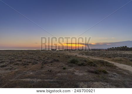 Sunset Seascape Of Salgados Beach In Albufeira, Algarve Tourism Destination Region, Portugal.
