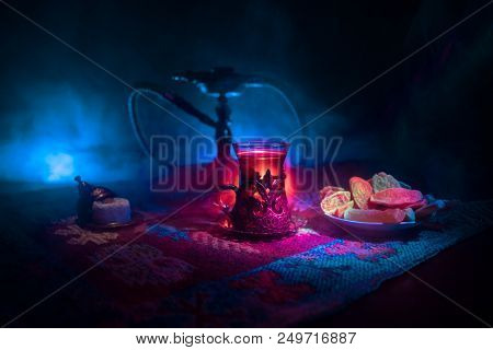 Hookah Hot Coals On Shisha Bowl Making Clouds Of Steam At Arabian Interior. Oriental Ornament On The