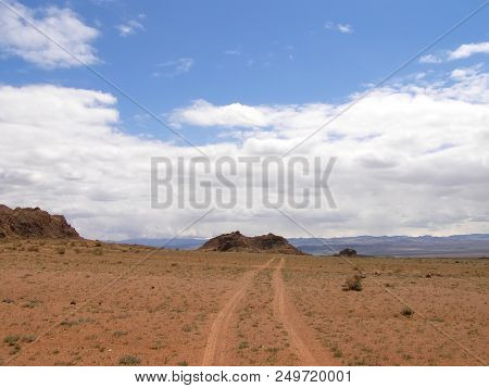 Mongolian Natural Landscapes Surrounded By Mountains And Rocks.