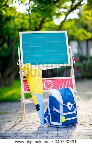 School Beginning Concept. Satchel And Schoolbag, Backpack, Desk And Traditional German School Cone W