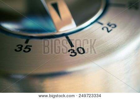 30 Minutes - A Macro Of An Analog Chrome Kitchen Timer