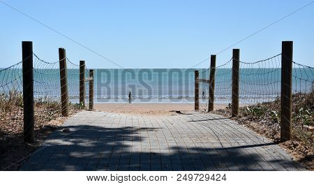 Sea Beach Wooden Walkway Path Entrance. Sandy Ocean Beach Entrance To Mindil Beach, Darwin, Northern