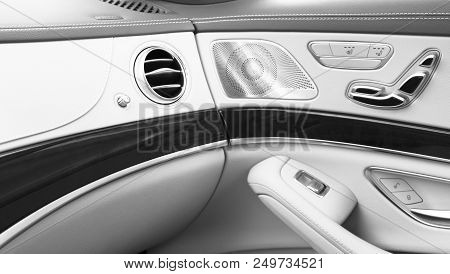 Ac Ventilation Deck Luxury Car Interior. Door Handle With Power Seat Contol Buttons Of A Luxury Pass