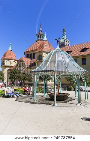 Sopot, Poland - June 6, 2018: Balneological Department With Fountain By The Baltic Sea And Sopot Pie