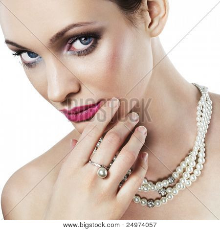 Beautiful woman with pearl jewelry