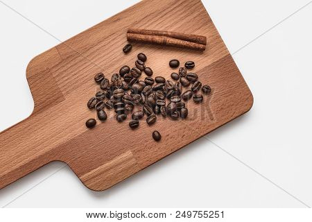 Vanilla Sticks With Coffee Beansa Flower On A Old Wooden Background With Copy Space For Your Text.
