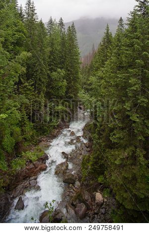 Morskie Oko.  Waterfall In Tatra Mountains. Morskie Oko.