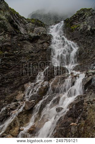 Morskie Oko.  Waterfall In Tatra Mountains. Morskie Oko.