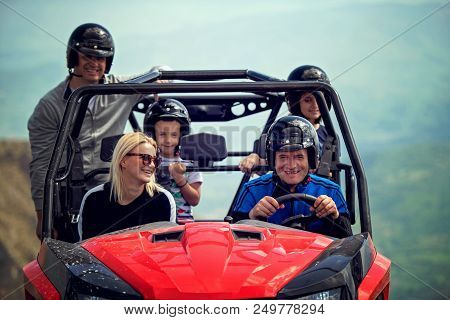 Friends Driving Off-road With Quad Bike Or Atv And Utv Vehicles.