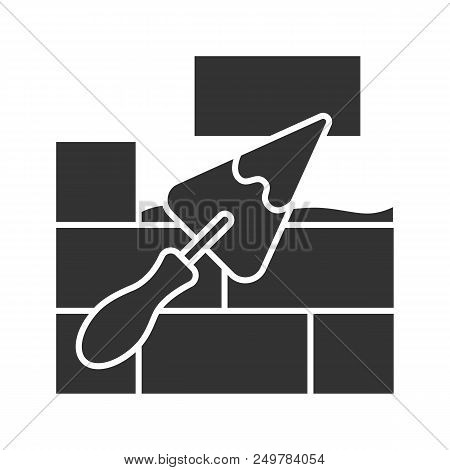 Brick Wall With Triangular Shovel Glyph Icon. Putty Knife, Spatula. Cement Solution. Silhouette Symb