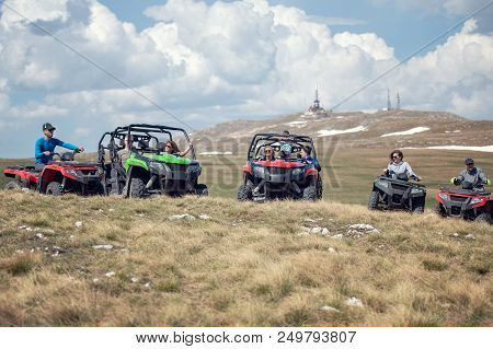 Friends Driving Off-road With Quad Bike Or Atv And Utv Vehicles.