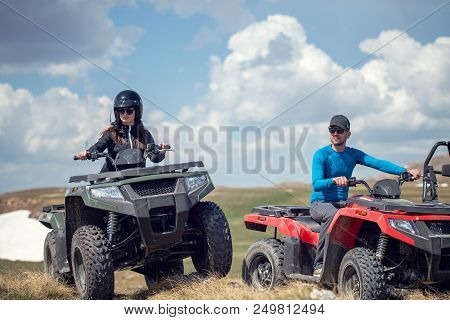 Friends Driving Off-road With Quad Bike Or Atv And Utv Vehicles.