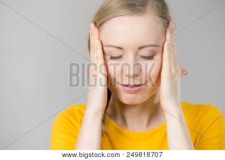 Young Blonde Woman Having Serious Migrene Suffering From Horrible Head Ache Feeling Big Pain.
