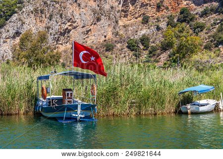 Lycian Tombs In The Mountains On The Dalyan River, Turkey. Dalyan Canal View. Dalyan Is Populer Tour