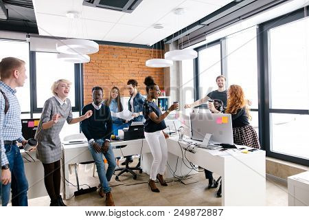 Workers With Positive Emotions Are Commemorating Their Successful Contract. Lucky Deal