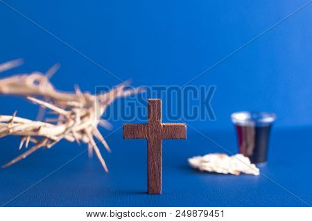 Symboles Of Christianity And The Communion On A Blue Background
