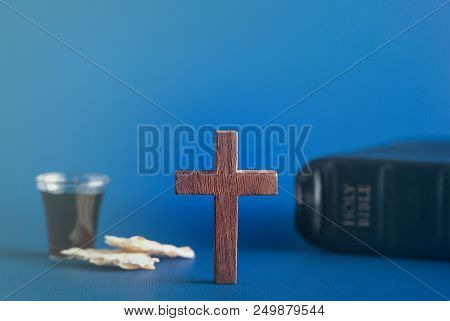 Symboles Of Christianity And The Communion On A Blue Background