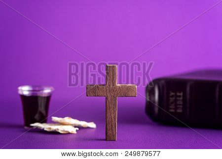 Symboles Of Christianity And The Communion On A Purple Background