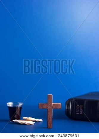 Symboles Of Christianity And The Communion On A Blue Background
