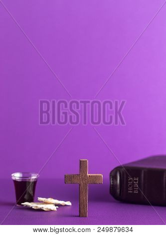 Symboles Of Christianity And The Communion On A Purple Background