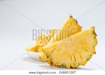 Healthy Sliced Pineapple Isolated On White Background